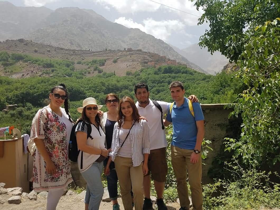A group of hikers standing together in the Atlas Mountains