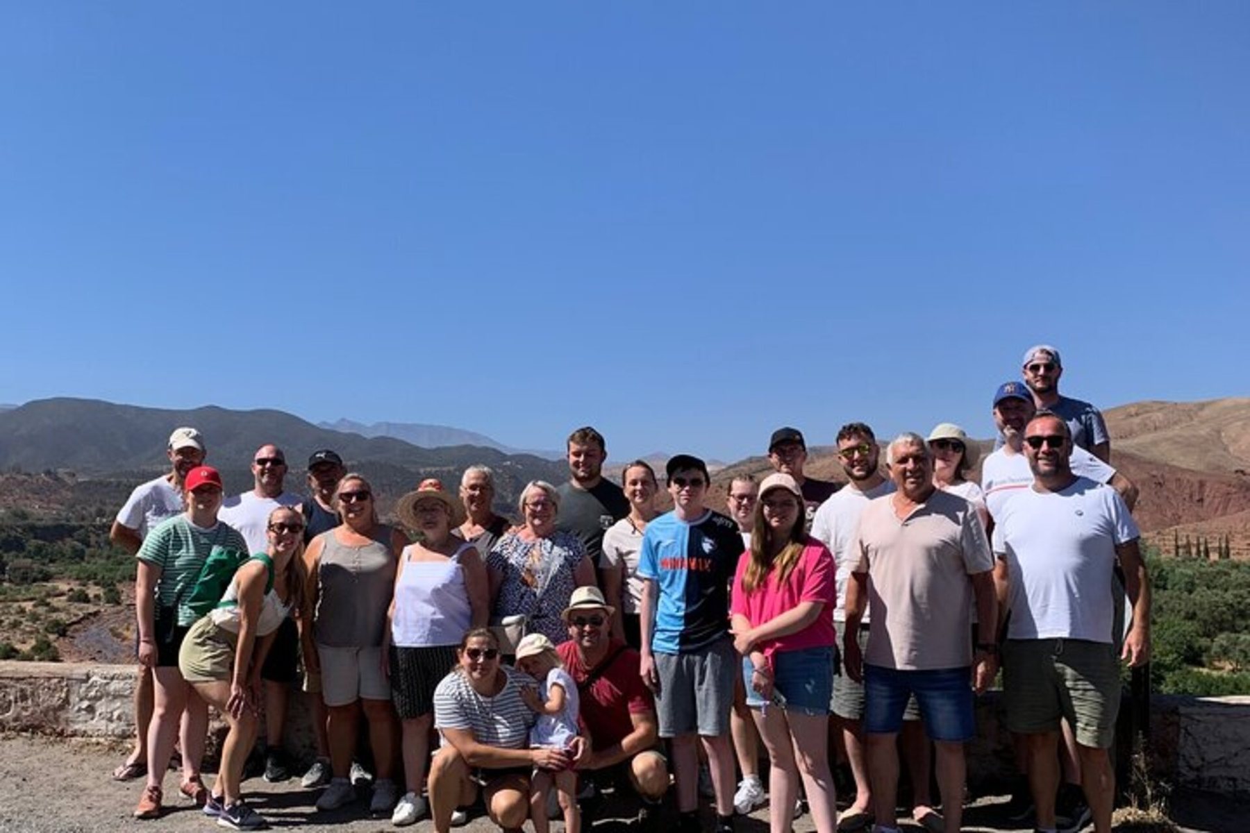 A group of travellers in a mountain valley