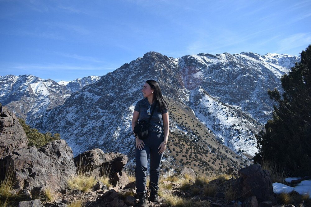 A trekker among snowy Atlas mountains